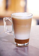 cup of cappuccino with milk