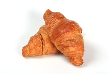 Fresh french croissant on a white background