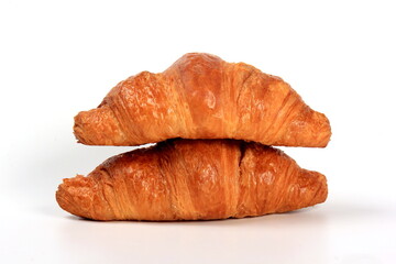 Fresh french croissant on a white background