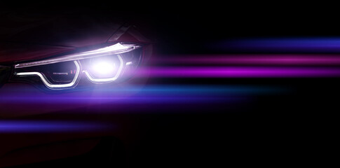 Car headlights with light rays and copy space, banner. Neon purple and blue light of car headlights on a dark background, panorama, close up .