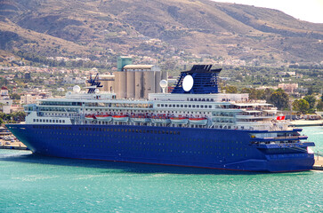 Classic blue white cruiseship cruise ship liner in port of Chania, Crete in Greece on sunny summer...