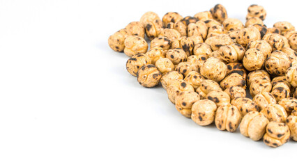Roasted chickpea. Group of roasted chickpeas isolated on white background. selective focus. Leblebi in Turkish.