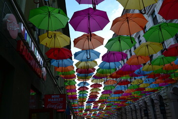 Fototapeta na wymiar Street with colorful umbrellas