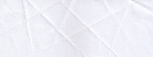 The texture of white paper with kinks. Background of crumpled cardboard.