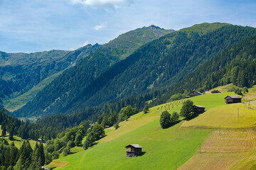 Fototapeta na wymiar Agricultural Field in the Beautiful Surroundings of the Village Maria Luggau, Austria