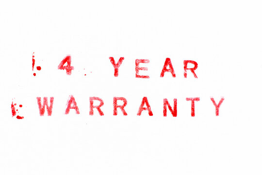 Red color ink rubber stamp in word 4 year warranty on white paper background
