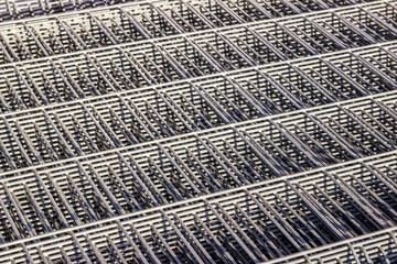 stack steel grating fence made with wire.