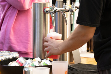 Serving tap beer at an outdoor festival