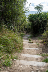 Fototapeta premium path through mountains ,stone step close up