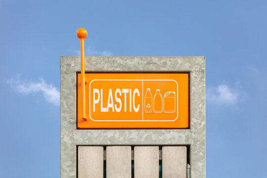 Dutch plastic disposal container in front of a blue sky