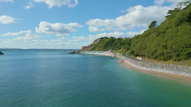Approaching Meadfoot Beach in Torquay, flying over sea