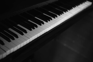 Classic grand piano keyboard close-up, Grand piano keyboard with glossy black and white keys,...