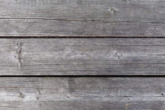 grey wooden wall of grey horizontal slats