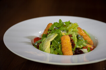 typical pervivan food, avocado salad with croutons