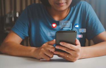  Woman using smart phone at home. . Social Distancing ,Working From Home concept, Social media and digital online concept, concept of vacation at home