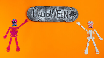 Happy Halloween holiday concept. Orange Halloween background design decorations, bats, patterns on...