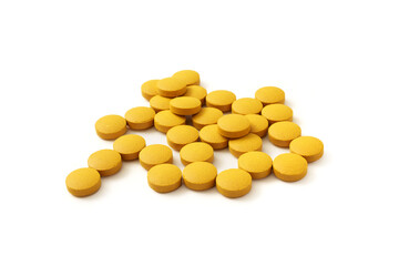 turmeric pills isolated on white background