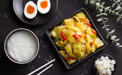 chinese pickled mustard greens , spicy salad pickle cabbage with sesame oil.