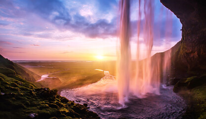 Fantastic Seljalandsfoss waterfall in Iceland during  sunset. Seljalandsfoss waterfall one a most popular travel destination landscape photographer locations. Iceland is the best country for travel