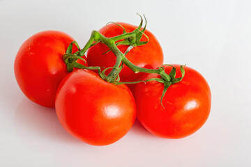 Close up shot of red tomato with water drops