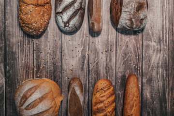 freshly baked bread on a wooden background