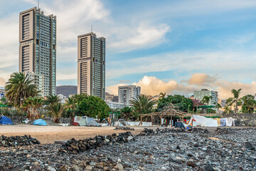 Santa Cruz de Tenerife, Spain - November 24, 2021: View from the Playa Negro beach to the Torres de...