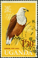 UGANDA - 1965: shows African fish eagle, series Arms of Uganda and Birds, 1965