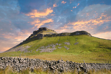 Beautiful coloured skies, sunrise over Penyghent in the Yorkshire Dales