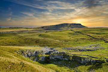 Beautiful coloured skies, sunrise over Penyghent in the Yorkshire Dales