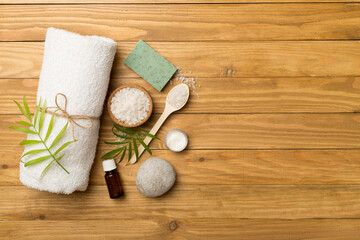 Obraz na płótnie Canvas Composition with spa products on wooden background, top view