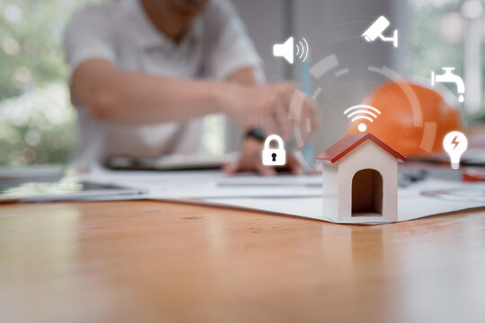 Smart home technology interface, Engineer Architects and Interior designer working with smart home interface of internet of things (IOT) connected. Concept of automation.