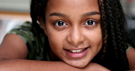 Brazilian adolescent girl smiling. Teenager african descent twelve year old kid