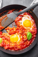 shakshuka eggs, tomato, pepper, vegetables breakfast healthy meal food snack diet on the table copy space food background rustic top view