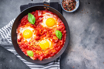 shakshuka eggs, tomato, pepper, vegetables breakfast healthy meal food snack diet on the table copy space food background rustic top view
