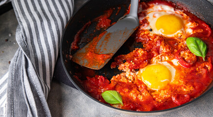 shakshuka eggs, tomato, pepper, vegetables breakfast healthy meal food snack diet on the table copy space food background rustic top view
