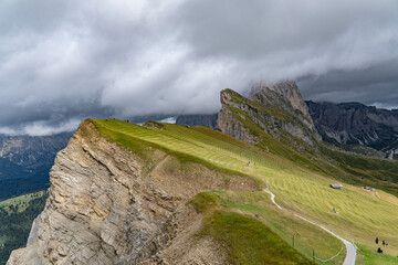 Landscape of the dolomites in the surroundings of Seceda on a cloudy day