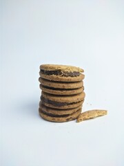 Sandwich biscuits, filled with chocolate, isolated on white background
