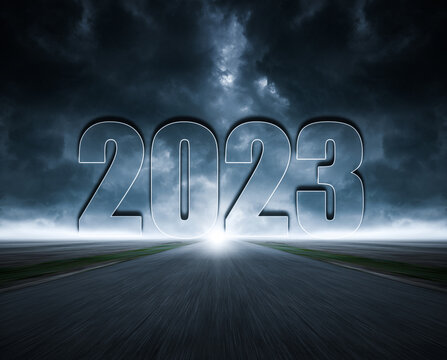 2023 Written On Heaven In The Middle Of Asphalt Road And Dark Cloudy Sky. Future Vision 2023