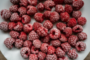 Frozen raspberries background