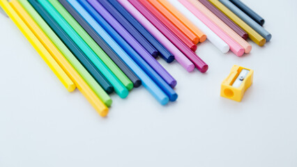 Fototapeta premium Colored pencil crayons in a row