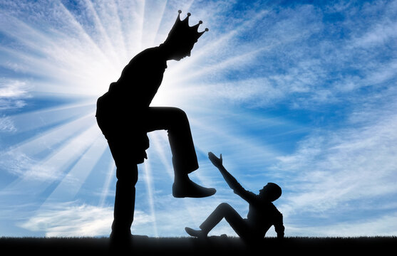 Big man with the crown on his head intends to destroy the little man. Concept of behavior as a selfish tyrant