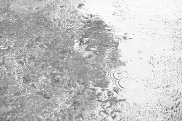 wet concrete floor in rainy day as black and white monochrome background