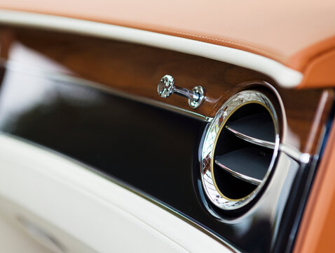 Ventilation In A Modern Car With Leather And Wood Trim