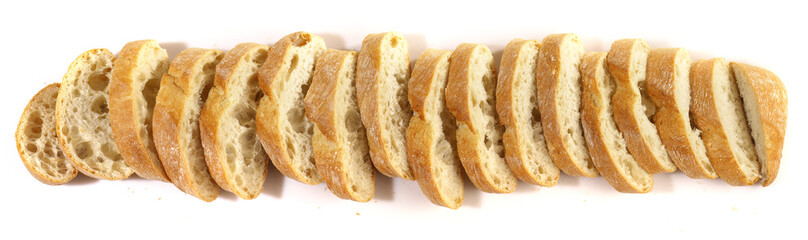 Crusty Ciabatta Bread Slices isolated on white Background - Panorama.