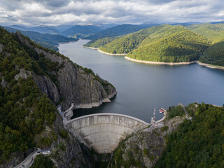 Obraz na płótnie Canvas Aerial view of the Vidraru Reservoir in the Fagaras Mountains in Romania
