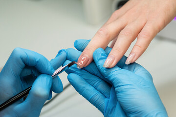 Fototapeta na wymiar Process nail modeling gel polish