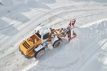 Winter road clearing snowplow