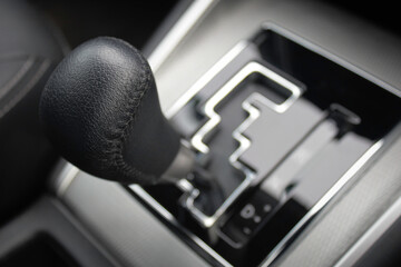 Automatic gear stick inside modern sport car. Luxury