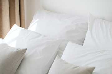 Fototapeta na wymiar Hypoallergenic pillows in white and clean pillowcases