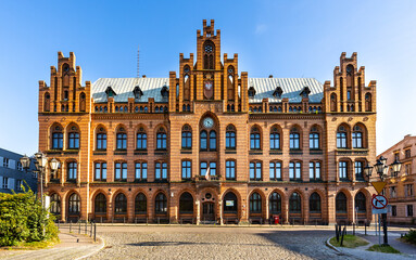 Neo-gothic Post Office building at Plac Wolnosci square in historic old town quarter of Koszalin in...